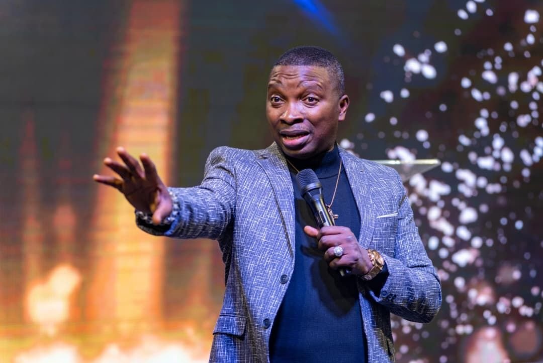 Dr. Kay Ijisesan preaching